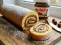 Un délicieux gâteau roulé à la Nutella, saupoudré de sucre glace. Une recette gâteau roulé facile pour un goûter gourmand.