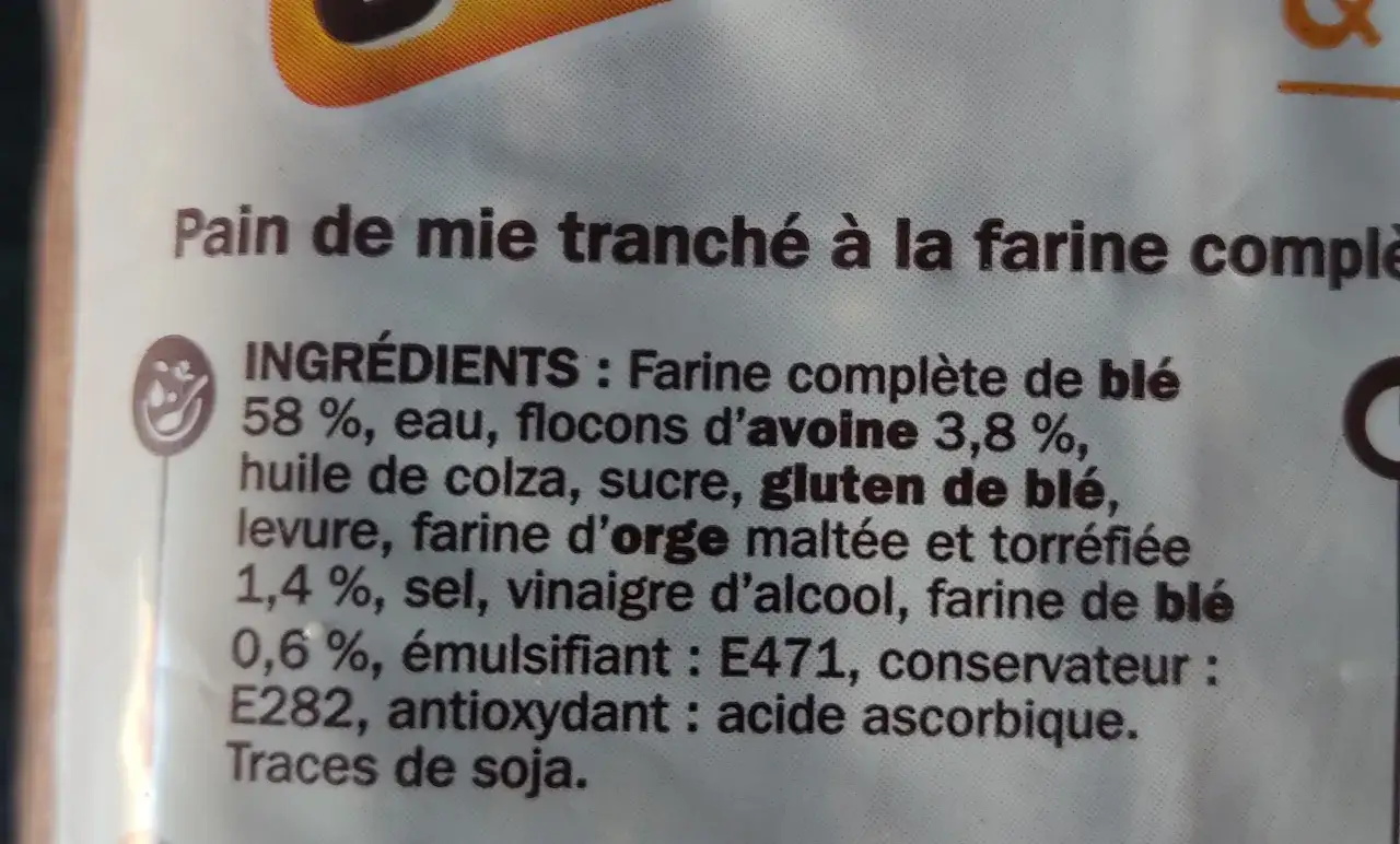 Composition du pain de mie : farine compl&egrave;te de bl&eacute;, eau, flocons d'avoine, huile de colza, sucre, gluten de bl&eacute;, levure, farine d'orge malt&eacute;e, sel, vinaigre d'alcool, &eacute;mulsifiant, conservateur, antioxydant. Traces de soja.